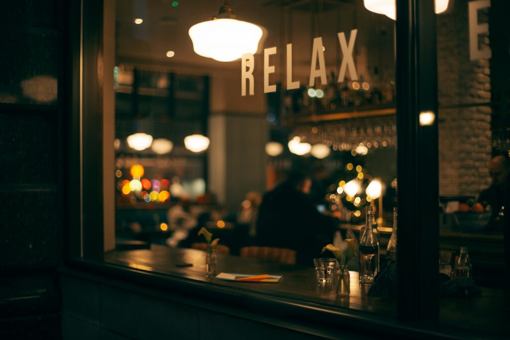 A cafe window reading 'Relax'