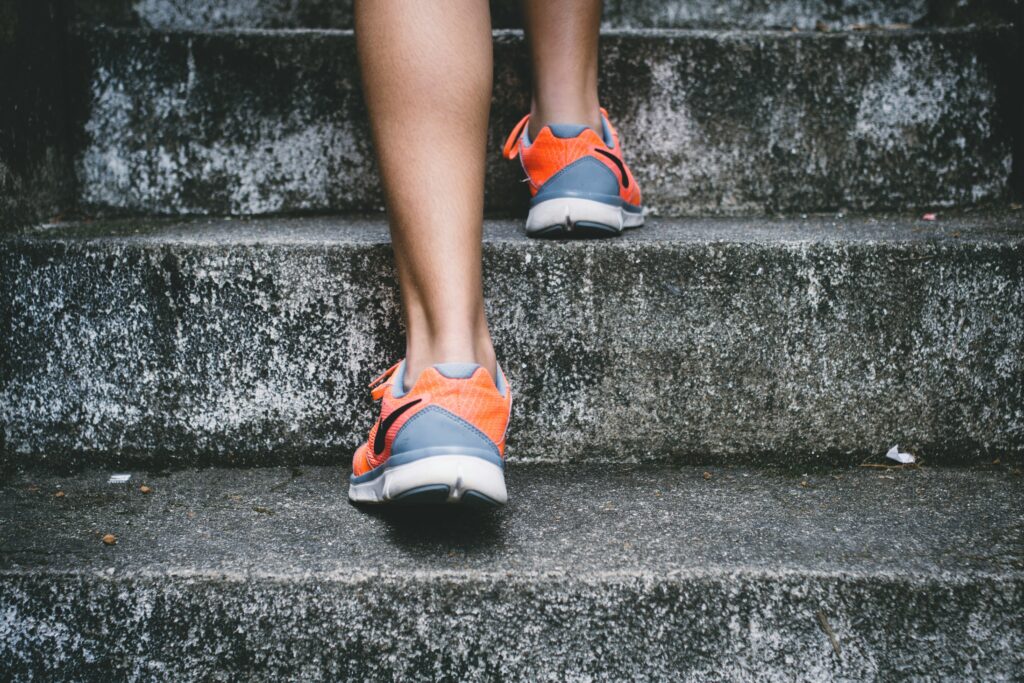 Close view of running shoes going up some stairs